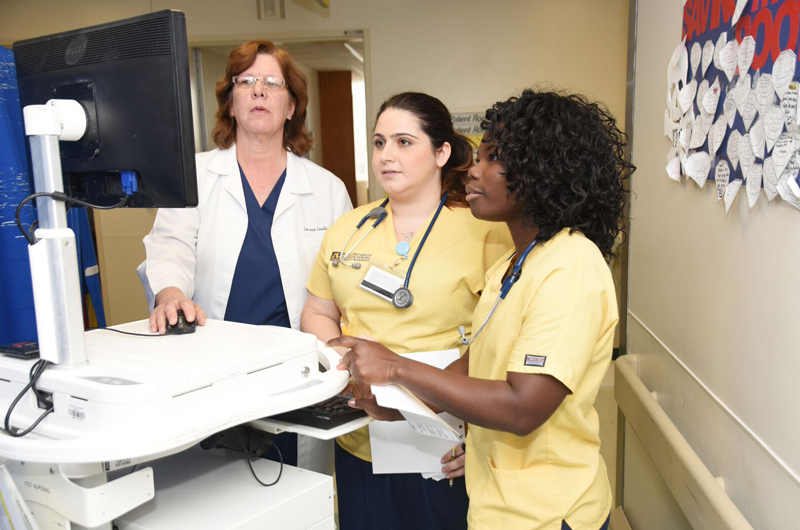 Lorraine Smallwood, a staff nurse at Hahnemann University Hospital, serves as an adjunct professor at Drexel passing along knowledge she's gained on the job.